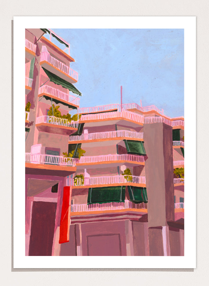 Shop Pink City Balconies by Sophia Novosel, a colorful city wall art print poster featuring pink apartment buildings, green awnings, balconies, and blue sky.