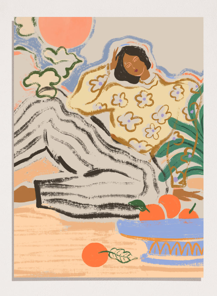 Artistic depiction of a person lounging on a beach with a bowl of fruit and flowers. Lazy Days by Arty Guava is a modern woman art print with warm colors, oranges, and relaxed still life details. Officially licensed wall poster.