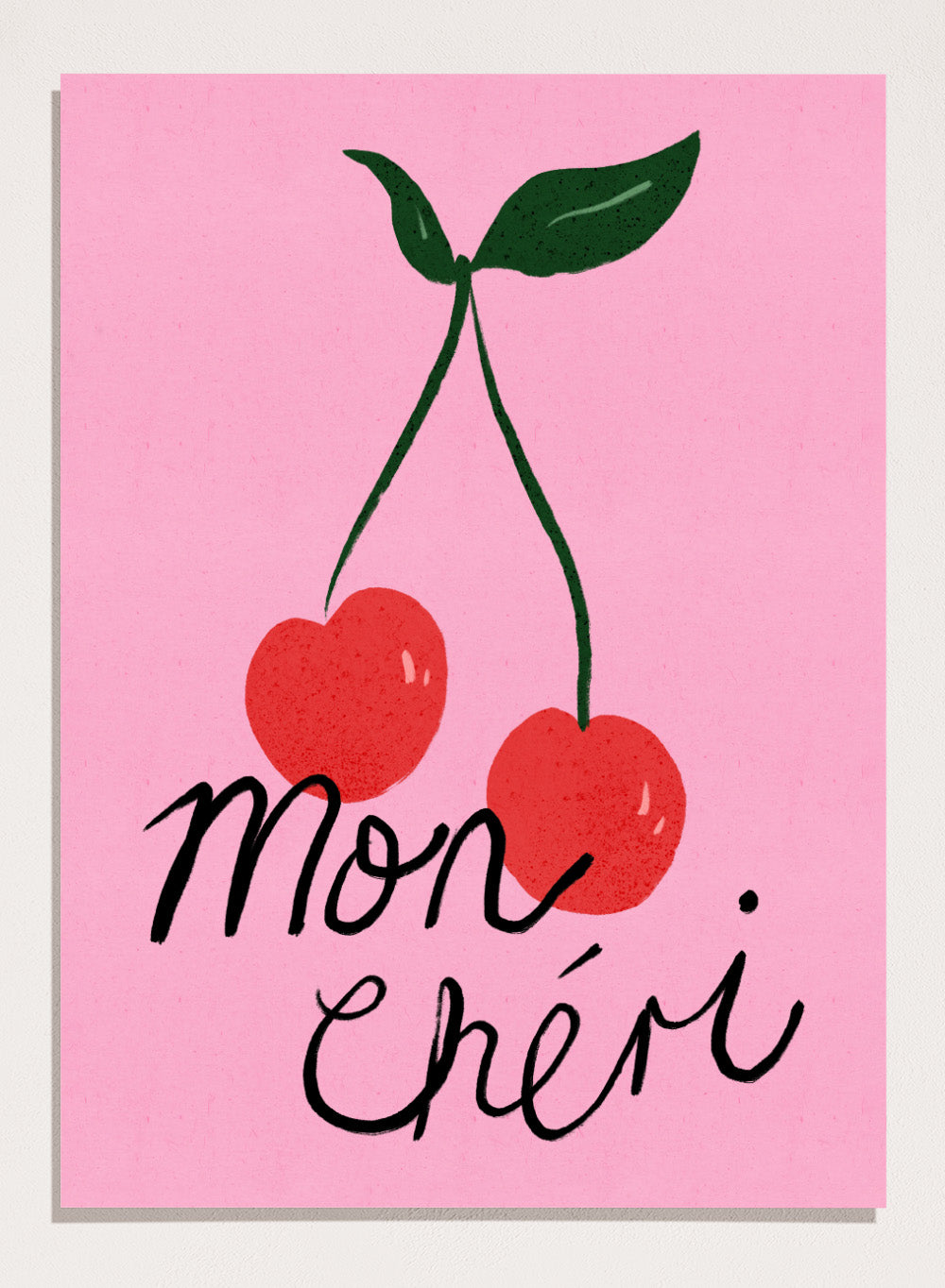 Two red cherries with green stems on a pink background and 'mon chéri' text. Mon Chéri by Dirkie Nell is a cherry typography art print featuring bold red fruit and playful lettering. A colorful love-inspired wall poster.