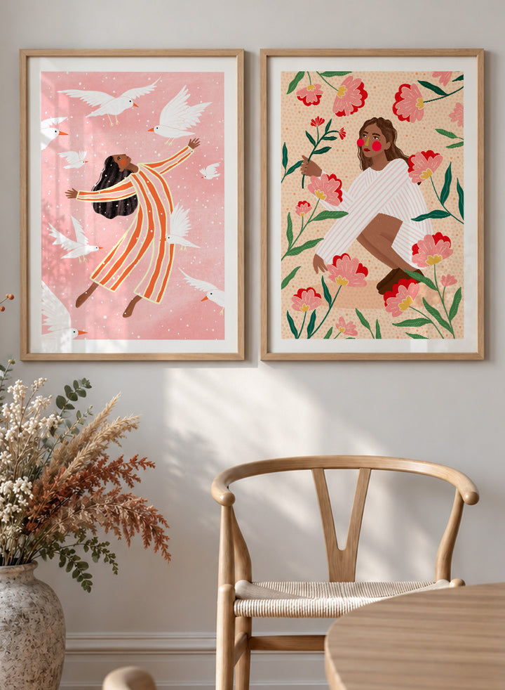 Shop In Her Happy Place by Bea Müller, a set of 2 figurative wall art prints posters featuring women surrounded by birds and flowers in soft pink tones.
