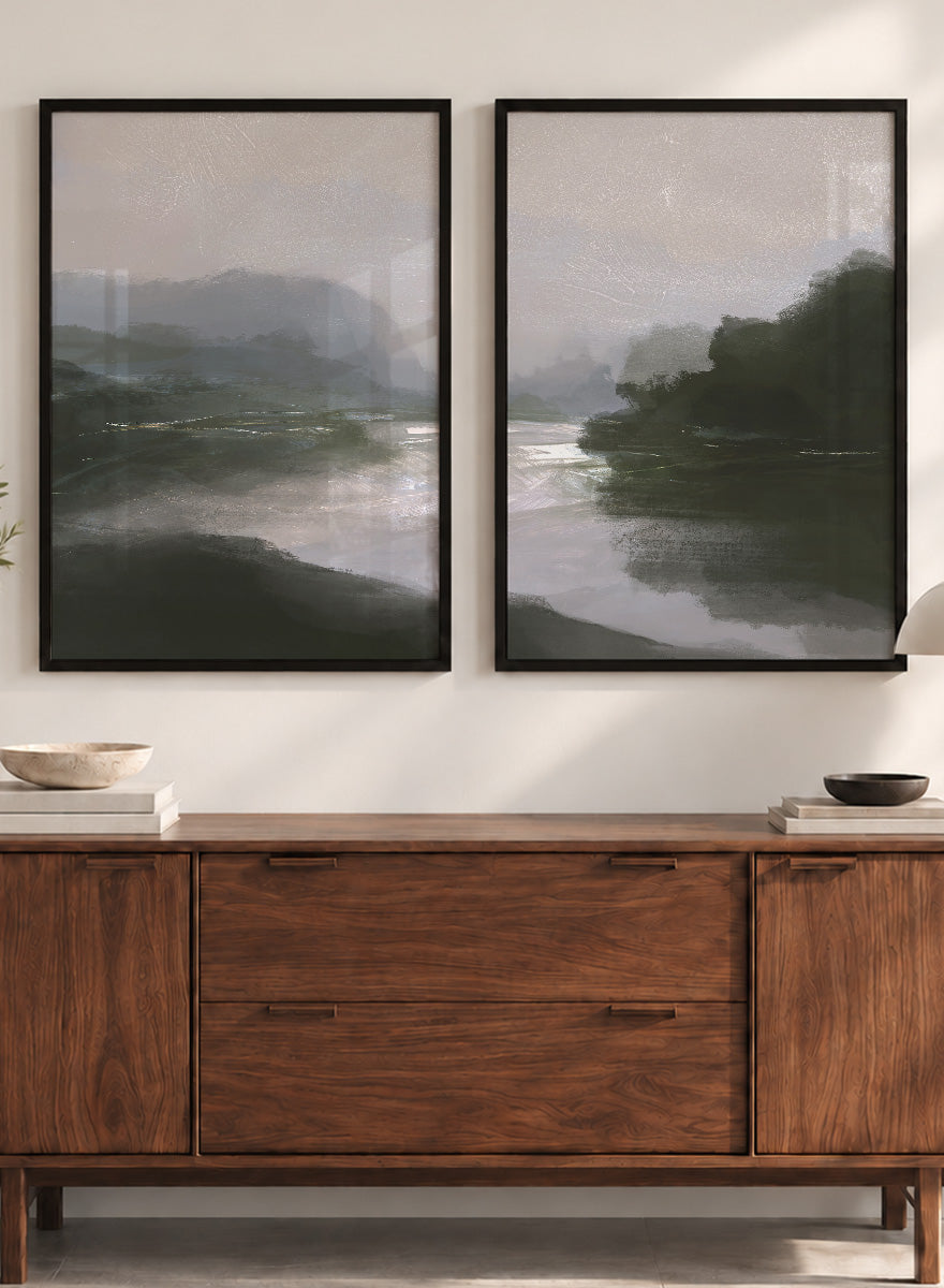 Shop Tranquillitas by Dan Hobday, a set of 2 landscape wall art prints posters featuring misty water, tree-lined banks, distant hills, and deep grey green tones.