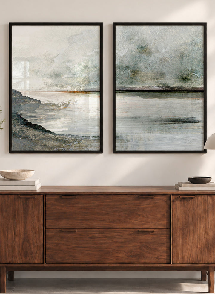 Shop Still Coast by Dan Hobday, a set of 2 coastal landscape wall art prints posters featuring misty water, rocky shoreline, and soft gray and green tones.