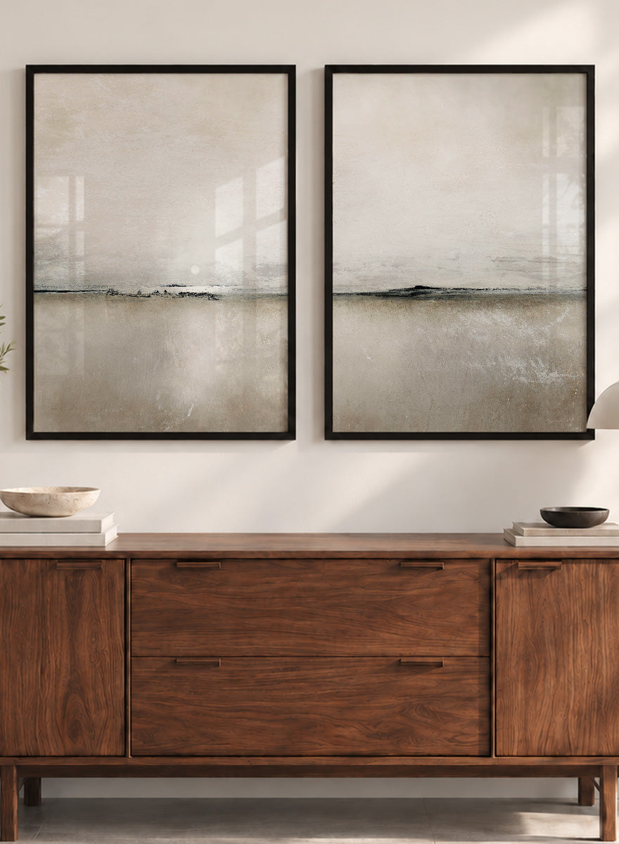 Shop Sunlight Bay by Dan Hobday, a set of 2 minimalist landscape wall art prints posters featuring a soft horizon, open water, and warm brown and cream tones.