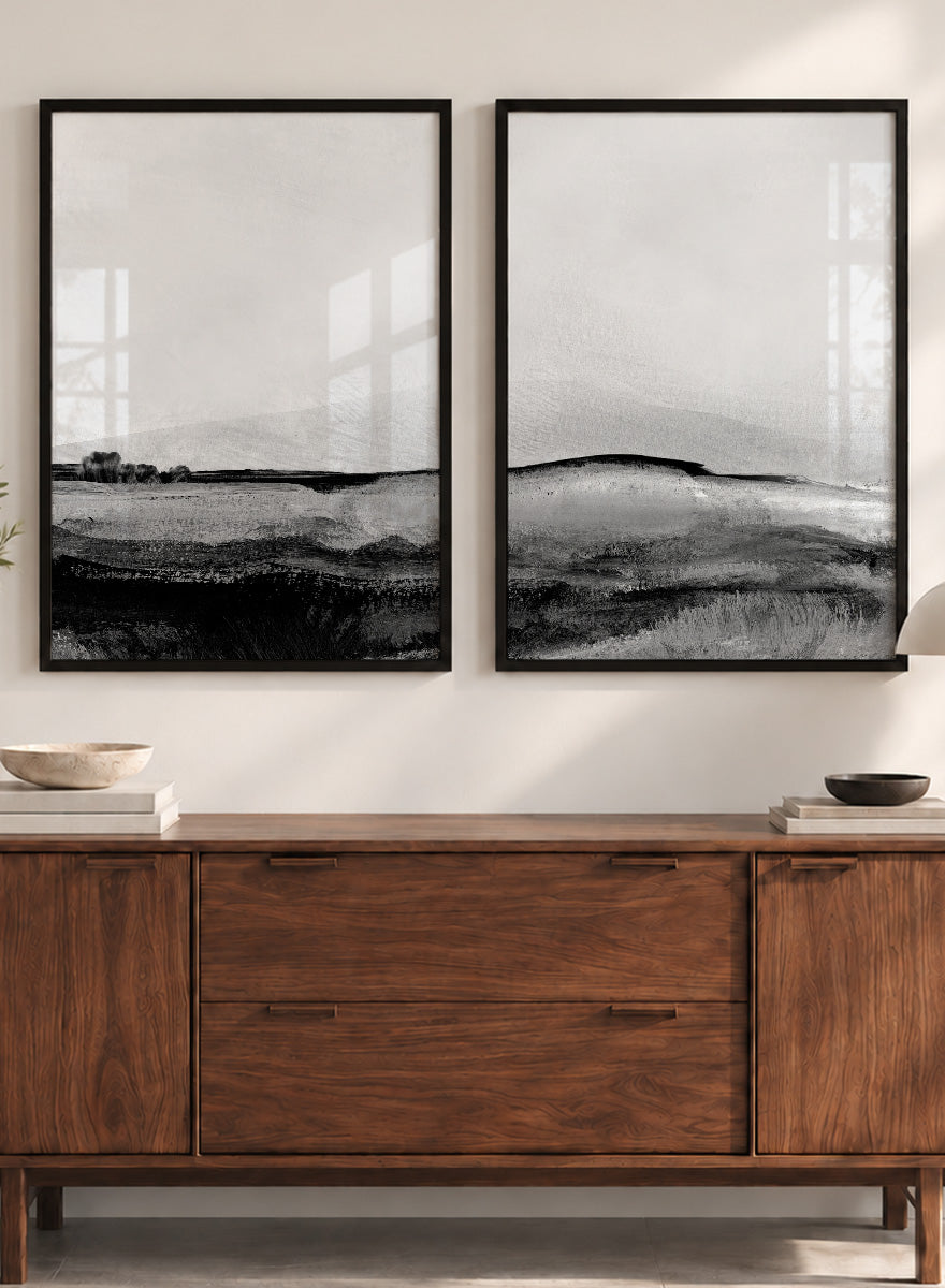 Shop Mono Landscape No.01 by Dan Hobday, a set of 2 black and white landscape wall art prints posters featuring layered hills and moody monochrome gray scenery.