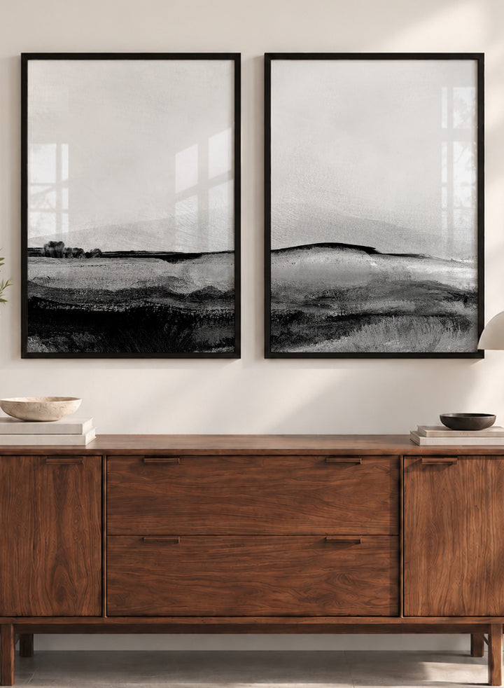 Shop Mono Landscape No.01 by Dan Hobday, a set of 2 black and white landscape wall art prints posters featuring layered hills and moody monochrome gray scenery.