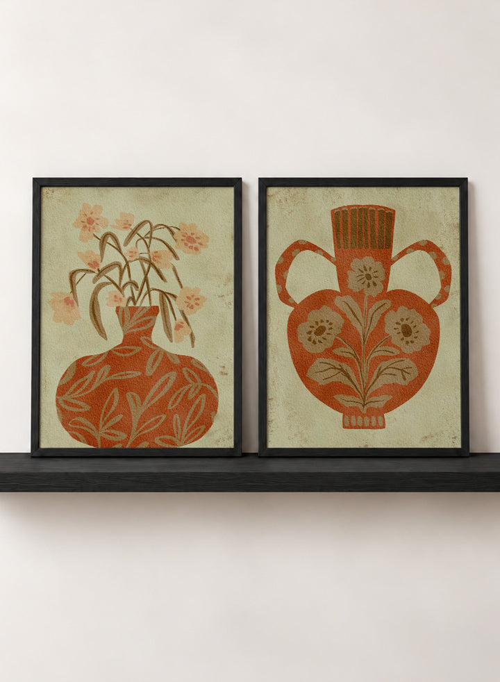 Shop Terracotta Floral Vases by Nikita Jariwala, a set of 2 botanical wall art prints posters featuring floral vase artwork in warm orange tones.