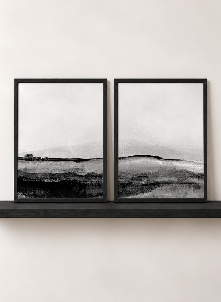 Shop Mono Landscape No.01 by Dan Hobday, a set of 2 black and white landscape wall art prints posters featuring layered hills and moody monochrome gray scenery.