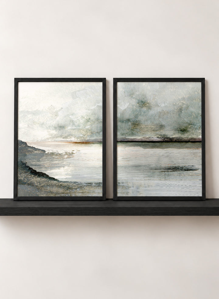 Shop Still Coast by Dan Hobday, a set of 2 coastal landscape wall art prints posters featuring misty water, rocky shoreline, and soft gray and green tones.