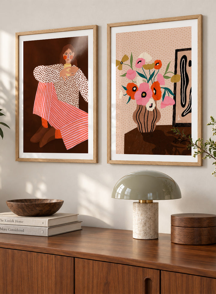 Shop Autumn Mood by Bea Müller, a set of 2 wall art prints posters pairing a modern figurative portrait with a floral still life in warm brown tones.