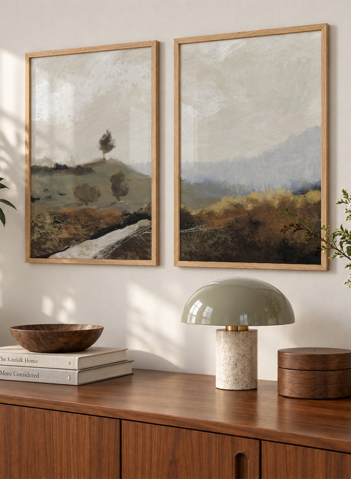 Shop La Collina by Dan Hobday, a set of 2 landscape wall art prints posters featuring rolling hills, winding paths, and warm earthy countryside tones.