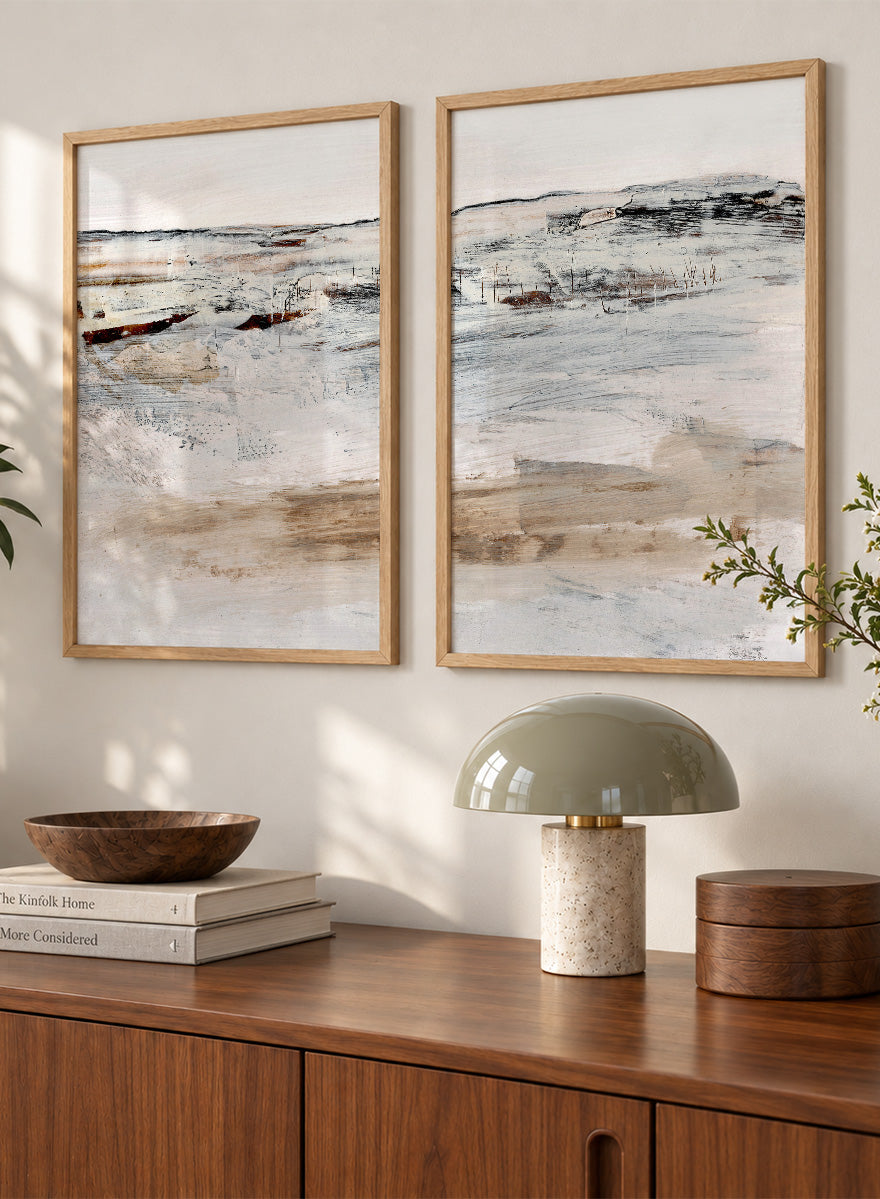 Shop August by Dan Hobday, a set of 2 abstract landscape wall art prints posters featuring a soft horizon, weathered texture, and warm cream tones.