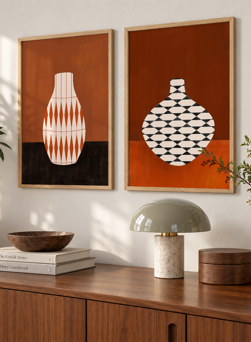 Shop Geometric Vase by Elena Ristova, a set of 2 modern wall art prints posters featuring bold patterned vases in orange, brown, black, and rich rust tones.