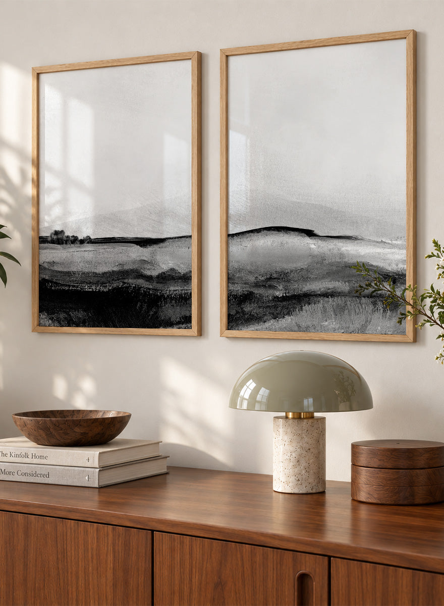 Shop Mono Landscape No.01 by Dan Hobday, a set of 2 black and white landscape wall art prints posters featuring layered hills and moody monochrome gray scenery.