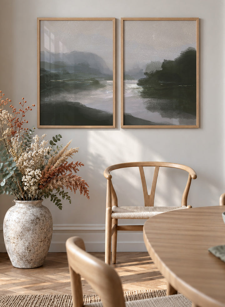 Shop Tranquillitas by Dan Hobday, a set of 2 landscape wall art prints posters featuring misty water, tree-lined banks, distant hills, and deep grey green tones.