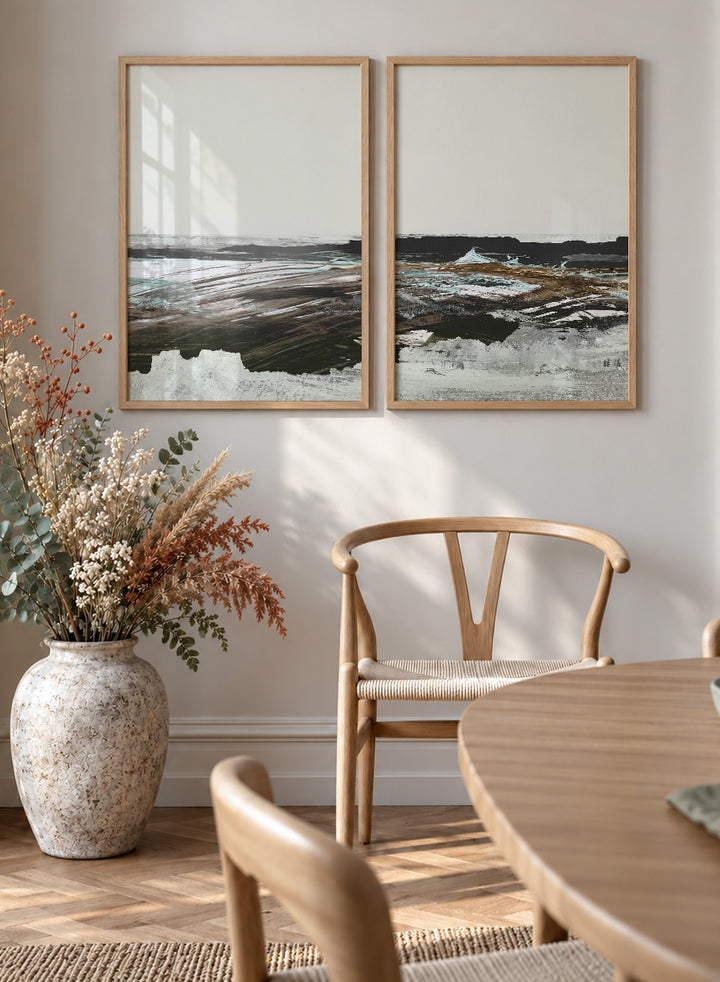 Shop Constantine Bay by Dan Hobday, a set of 2 coastal landscape wall art prints posters featuring windswept shoreline, surf, and muted blue-brown tones.