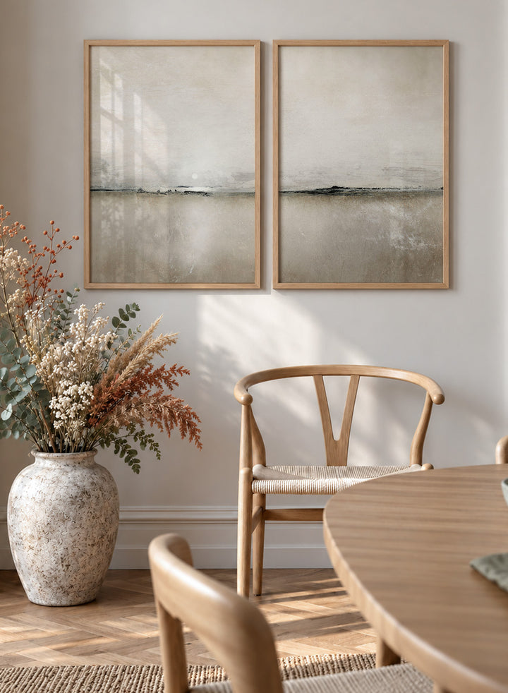 Shop Sunlight Bay by Dan Hobday, a set of 2 minimalist landscape wall art prints posters featuring a soft horizon, open water, and warm brown and cream tones.