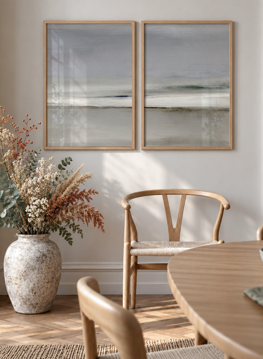 Shop Horizon by Dan Hobday, a set of 2 minimalist landscape wall art prints posters featuring soft gray seascapes, open water, and a quiet horizon.