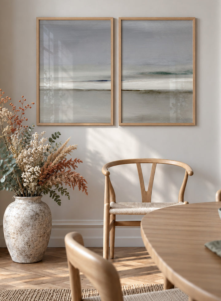 Shop Horizon by Dan Hobday, a set of 2 minimalist landscape wall art prints posters featuring soft gray seascapes, open water, and a quiet horizon.