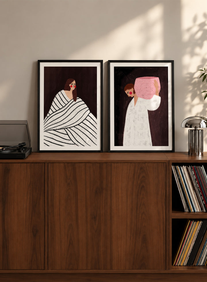 Shop In Her Own World by Bea Müller, a set of 2 figurative wall art prints posters featuring modern women, bold stripes, pink accents, and rich brown tones.