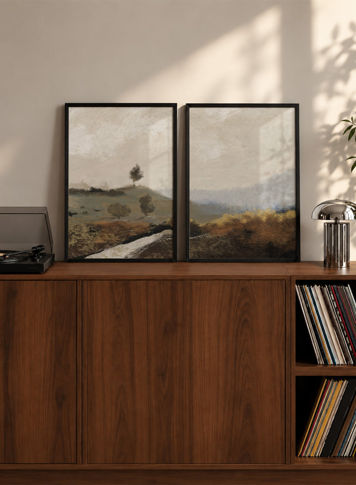 Shop La Collina by Dan Hobday, a set of 2 landscape wall art prints posters featuring rolling hills, winding paths, and warm earthy countryside tones.