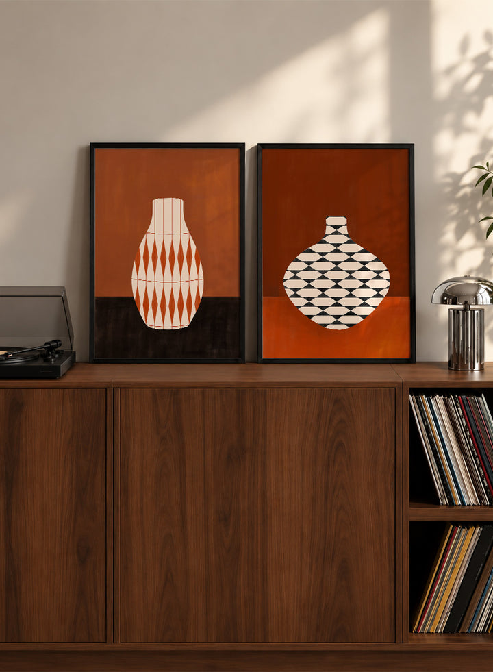 Shop Geometric Vase by Elena Ristova, a set of 2 modern wall art prints posters featuring bold patterned vases in orange, brown, black, and rich rust tones.
