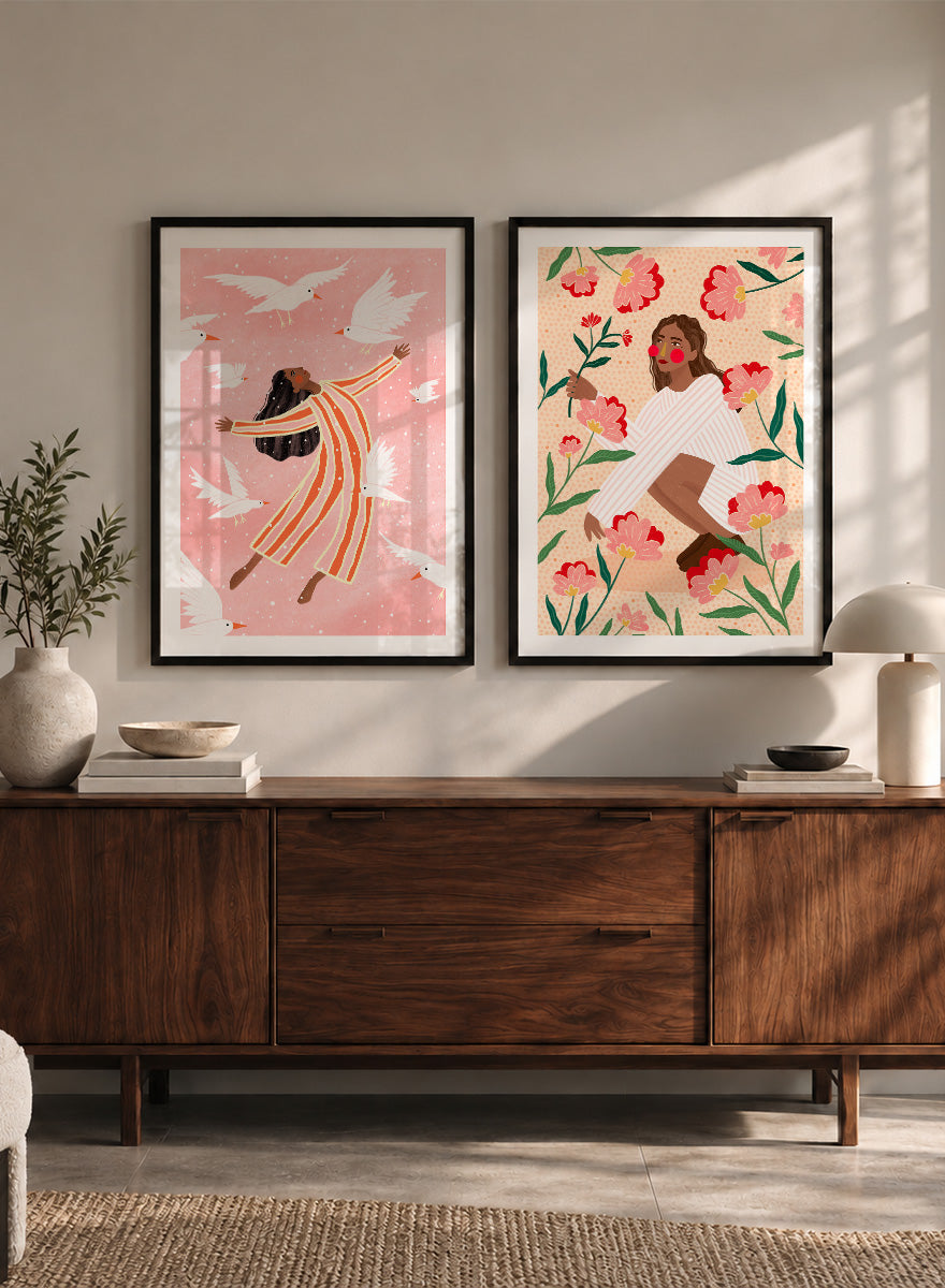 Shop In Her Happy Place by Bea Müller, a set of 2 figurative wall art prints posters featuring women surrounded by birds and flowers in soft pink tones.