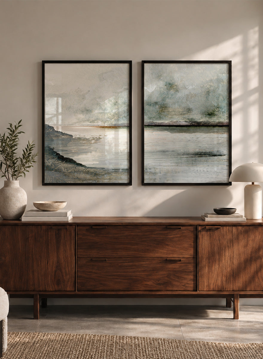 Shop Still Coast by Dan Hobday, a set of 2 coastal landscape wall art prints posters featuring misty water, rocky shoreline, and soft gray and green tones.