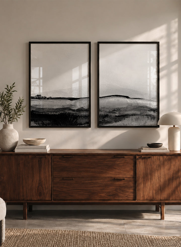 Shop Mono Landscape No.01 by Dan Hobday, a set of 2 black and white landscape wall art prints posters featuring layered hills and moody monochrome gray scenery.