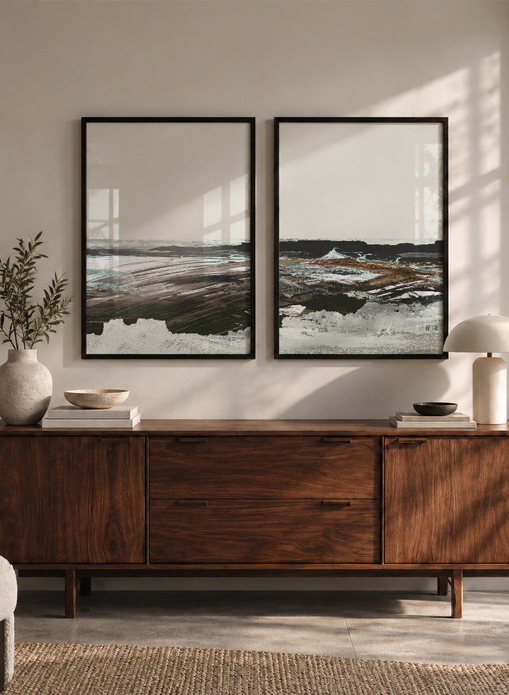 Shop Constantine Bay by Dan Hobday, a set of 2 coastal landscape wall art prints posters featuring windswept shoreline, surf, and muted blue-brown tones.