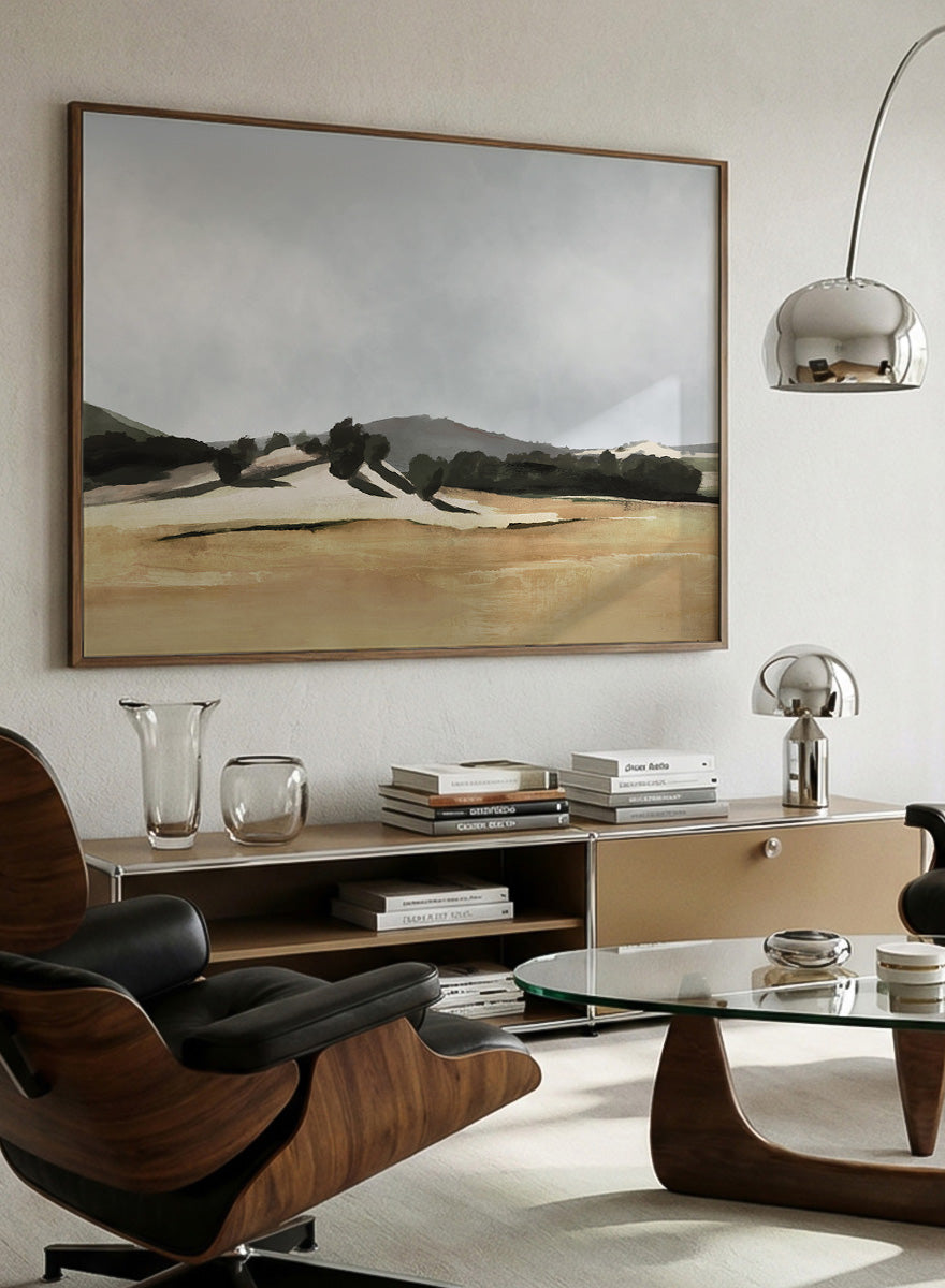 Shop Lazy Afternoon by Dan Hobday, a warm landscape art print featuring golden fields, dark trees, rolling hills, and soft late-summer tones.