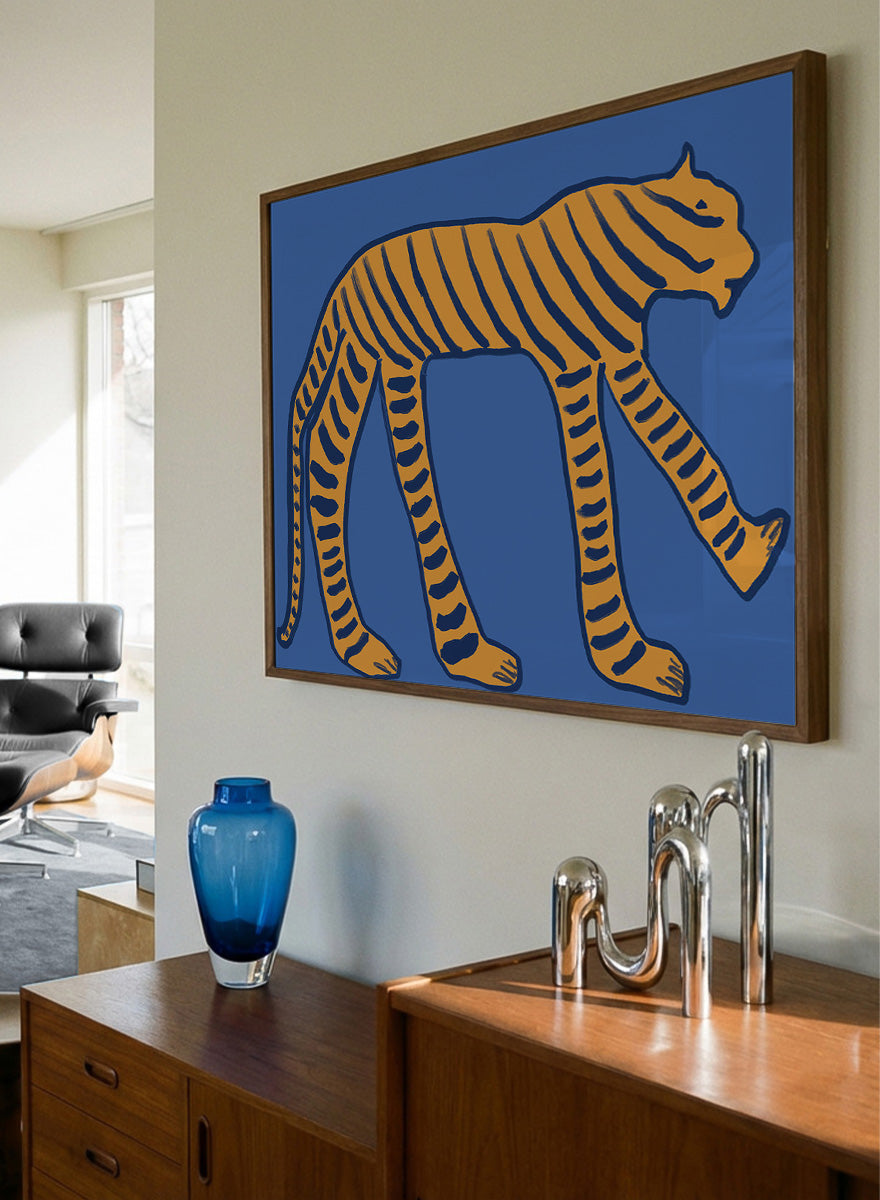 Stylized Blue Tiger by The Art Concept animal art print featuring an orange tiger with deep blue stripes and an elongated, graphic silhouette.