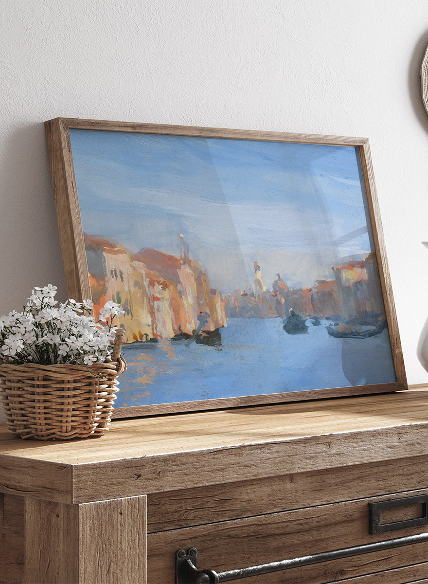 A framed impressionist-style painting of a canal scene with buildings, gondolas, and soft blue water and sky. Venice II by Hercules Brabazon Brabazon is a vintage watercolor art print featuring gondolas, a Venetian canal, soft blue water, and warm city light.