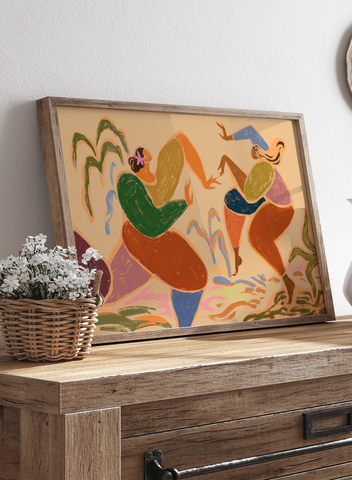 Colorful abstract artwork of two figures in a natural setting. Sisters of the Rhythm by Arty Guava is a modern wall art print of two women dancing. Bold color, expressive figures, officially licensed poster.