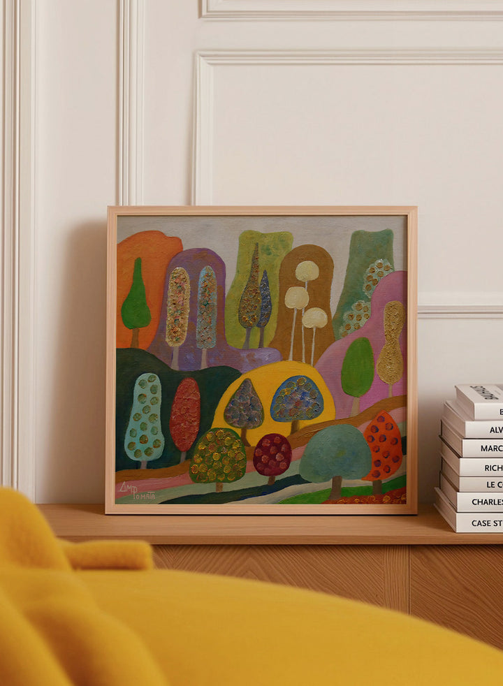 A framed abstract landscape painting featuring stylized trees and hills in a colorful, textured expressionist style. Shop Whimsical Colorful Trees by Angeles M. Pomata, a playful landscape art print featuring stylized trees, rolling hills, rich texture, and bold color.