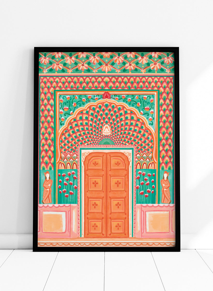 A colorful traditional Indian-style architectural artwork depicting an ornate arched doorway with a peach-orange double door, teal and pink patterned walls, floral motifs, and small statue figures on either side. Shop Vibrant Indian Archway by Nidhi Kachhadiya, a colorful Indian wall art print featuring an ornate archway, floral details, and coral pink tones.