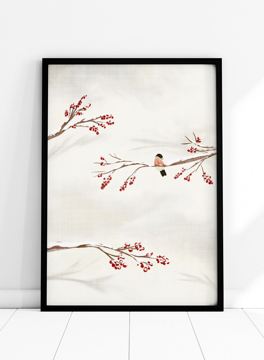 Shop Winter Bird With Berries by Nikita Jariwala, a winter bird wall art poster print featuring snowy branches, red berries, soft neutrals, and delicate seasonal detail.