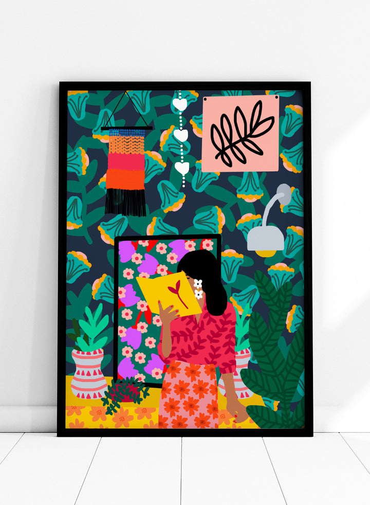 Colorful illustration of a woman reading a book with a vibrant patterned background. In Her Own Pages by Rafaela Mascaro fine art print featuring woman reading book, bold floral wallpaper, botanical interior, modern wall art poster.