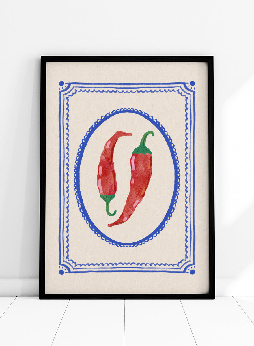 Spicy Chili Peppers by Katarzyna Gąsiorowska kitchen art print featuring red chilies in an ornate cobalt frame with vintage Mediterranean style.