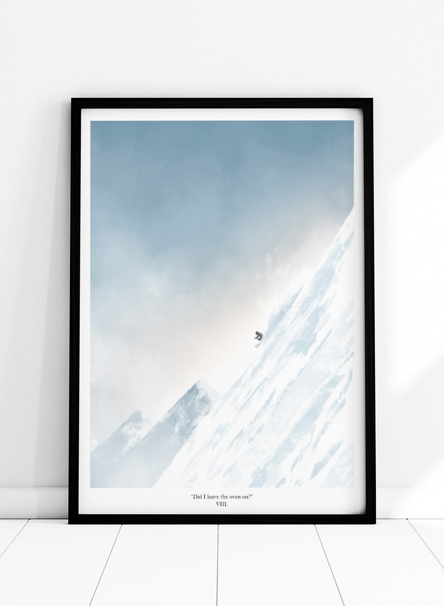A framed art print featuring a minimalist illustration of a skier on a snowy mountain slope under a pale blue sky, with the text &