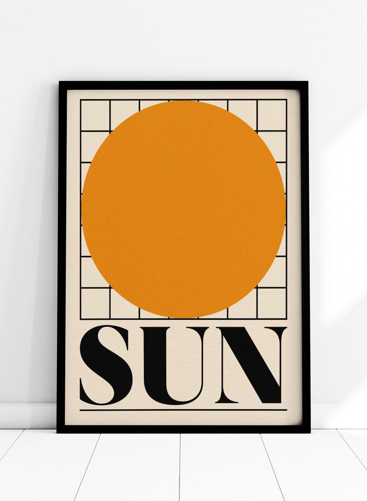 Poster with a large orange circle and the word 'SUN' on a beige background. Sun by Rosi Feist is a bold minimalist Bauhaus-inspired art print featuring an orange circle and graphic grid. Officially licensed modern poster with framing.