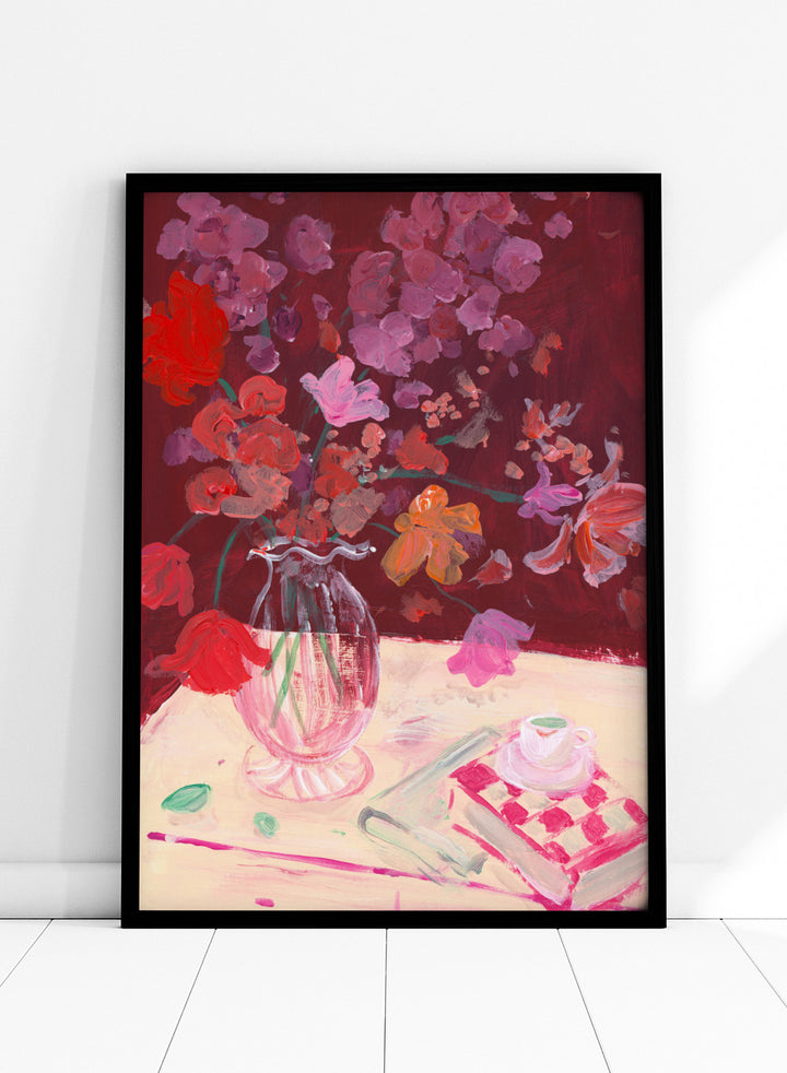 Colorful still life painting with flowers and a teacup on a table. Fall Bouquet by Katharina Puritscher art print featuring expressive floral still life, glass vase, coffee cup, book, and brushstrokes. Officially licensed wall poster.