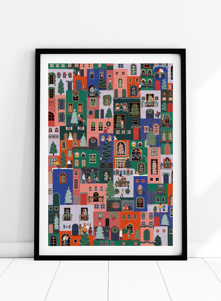 Shop Festive Christmas Town by Ceyda Alasar, a colorful Christmas wall art print poster featuring a lively holiday town filled with decorated homes and festive scenes.
