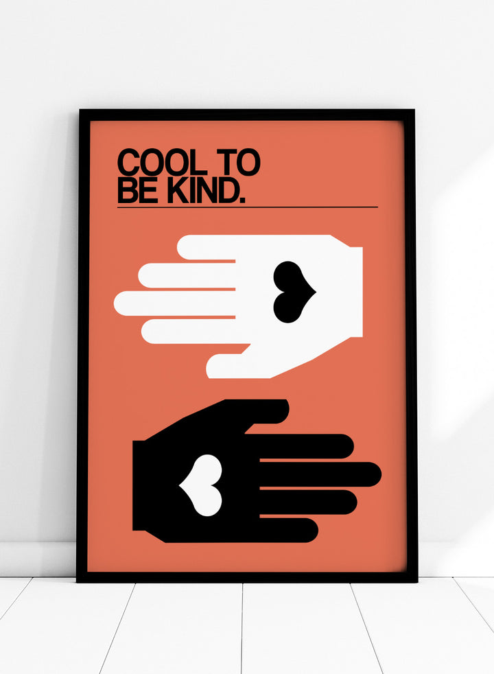 Poster with two hands reaching towards each other, one white and one black, on an orange background with 'Cool to be kind' text. Cool To Be Kind by Frances Collett is a modern kindness art print featuring two graphic hands with heart symbols. Officially licensed contemporary wall poster with optional framing.
