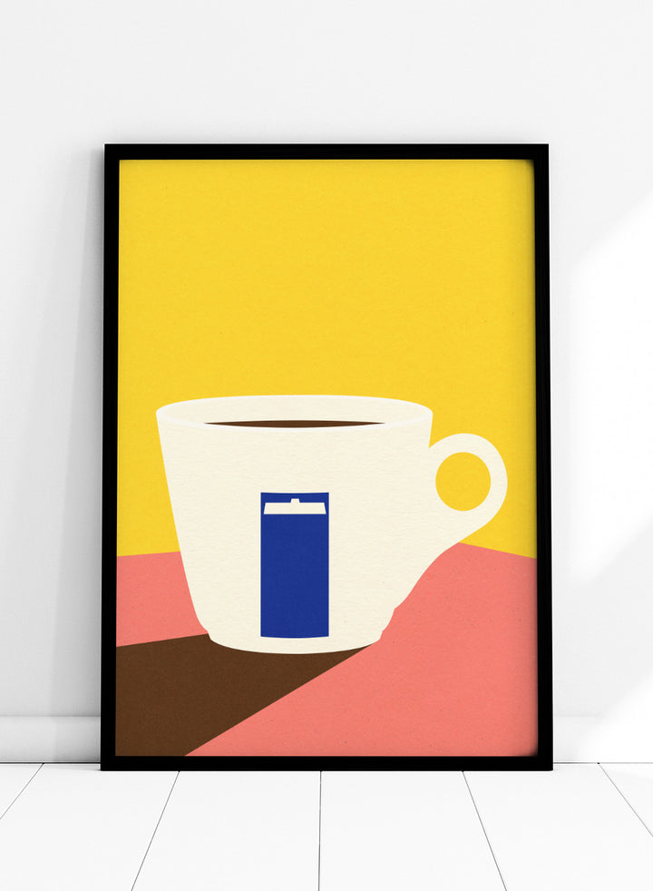 White coffee cup with a blue book design on a yellow and pink background. Tazza by Rosi Feist is a minimalist modern art print of a coffee cup in bold Bauhaus-inspired color blocks. Officially licensed fine art poster with framing.