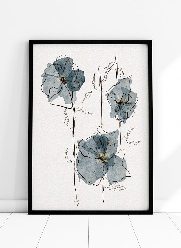 A framed watercolor and ink floral art print featuring three blue-gray flowers with black sketch lines on a white textured background. Shop Delicate Blue Blooms by Ankie Kooi, a modern floral wall art print poster featuring abstract watercolor flowers, botanical line art, blue, cream, and black.