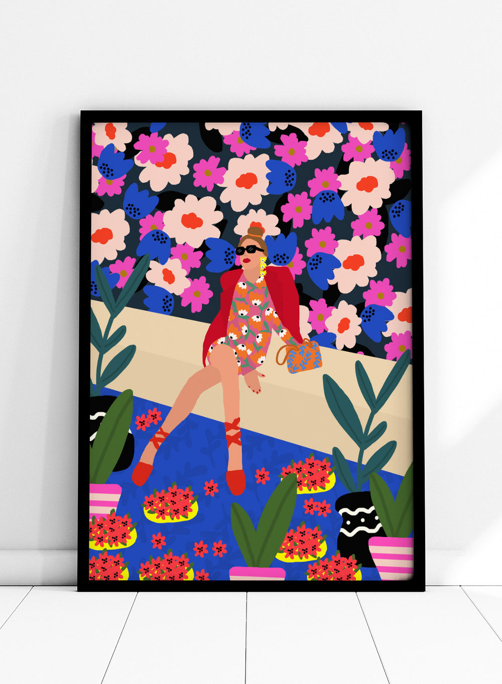 Colorful illustration of a woman sitting on a bench with floral and plant patterns. Bold and Blooming by Rafaela Mascaro fine art print poster featuring woman in vibrant floral garden by water, modern contemporary botanical wall art.