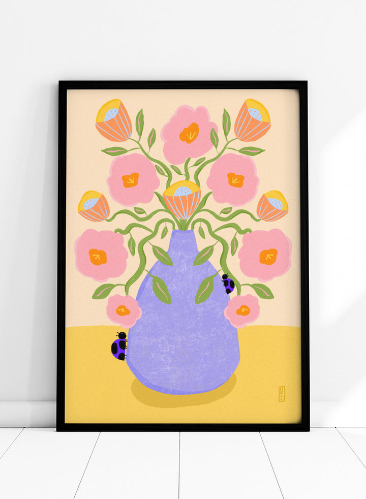 A stylized floral art print showing pink flowers with orange centers and green stems arranged in a light purple vase on a pale yellow surface. Shop Pink Flowers Ladybugs by Dirkie Nell, a colorful floral art print featuring pink flowers, a lavender vase, green stems, and playful ladybugs.