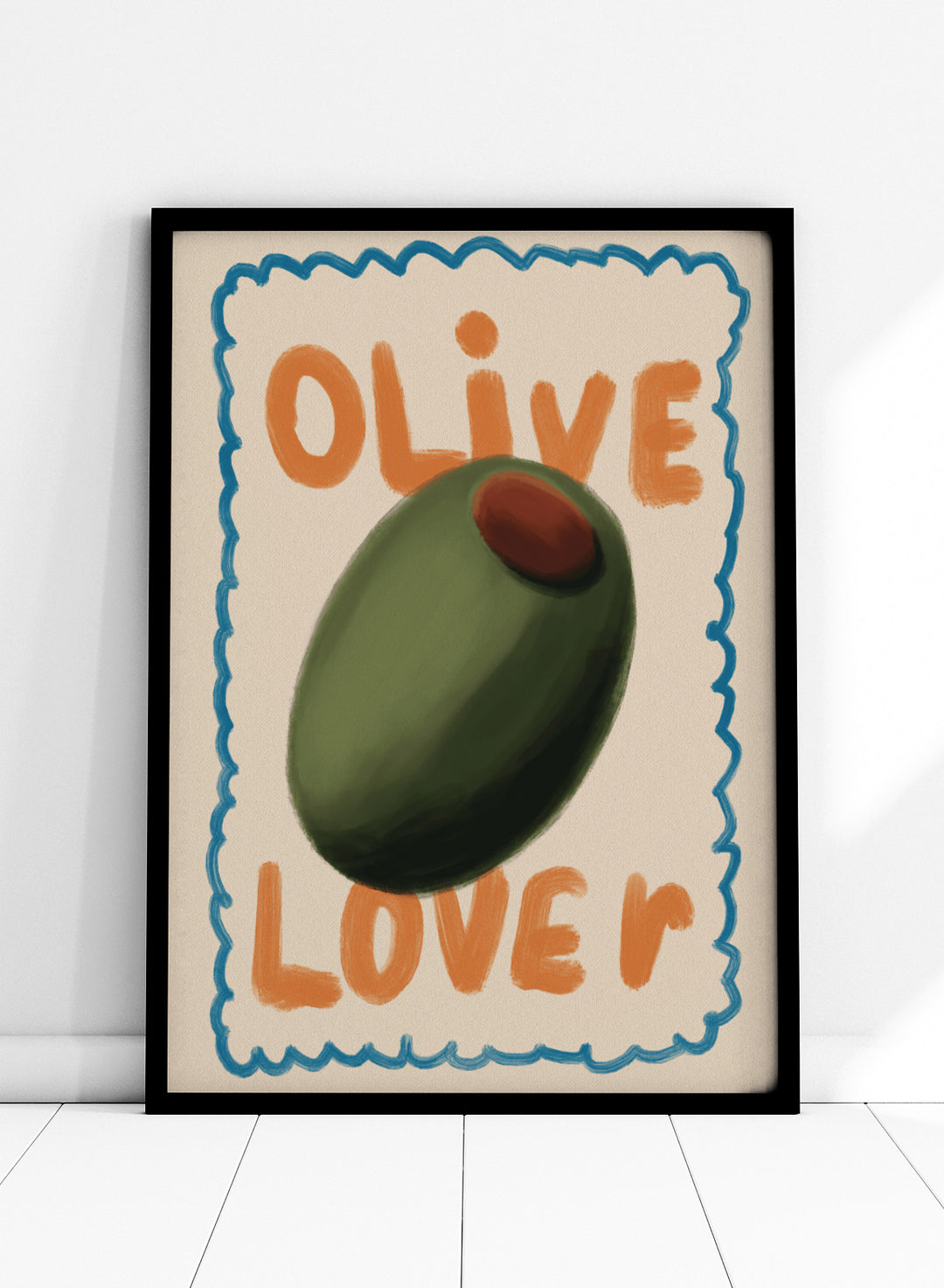 An art print featuring a stylized illustration of an olive with the words &