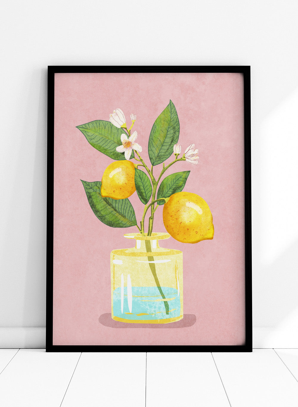 Illustration of lemons and a flower in a glass bottle on a pink background. Lemon Bunch In Vase by Raissa Oltmanns is a modern lemon still life art print featuring citrus fruit and floral kitchen wall poster design.