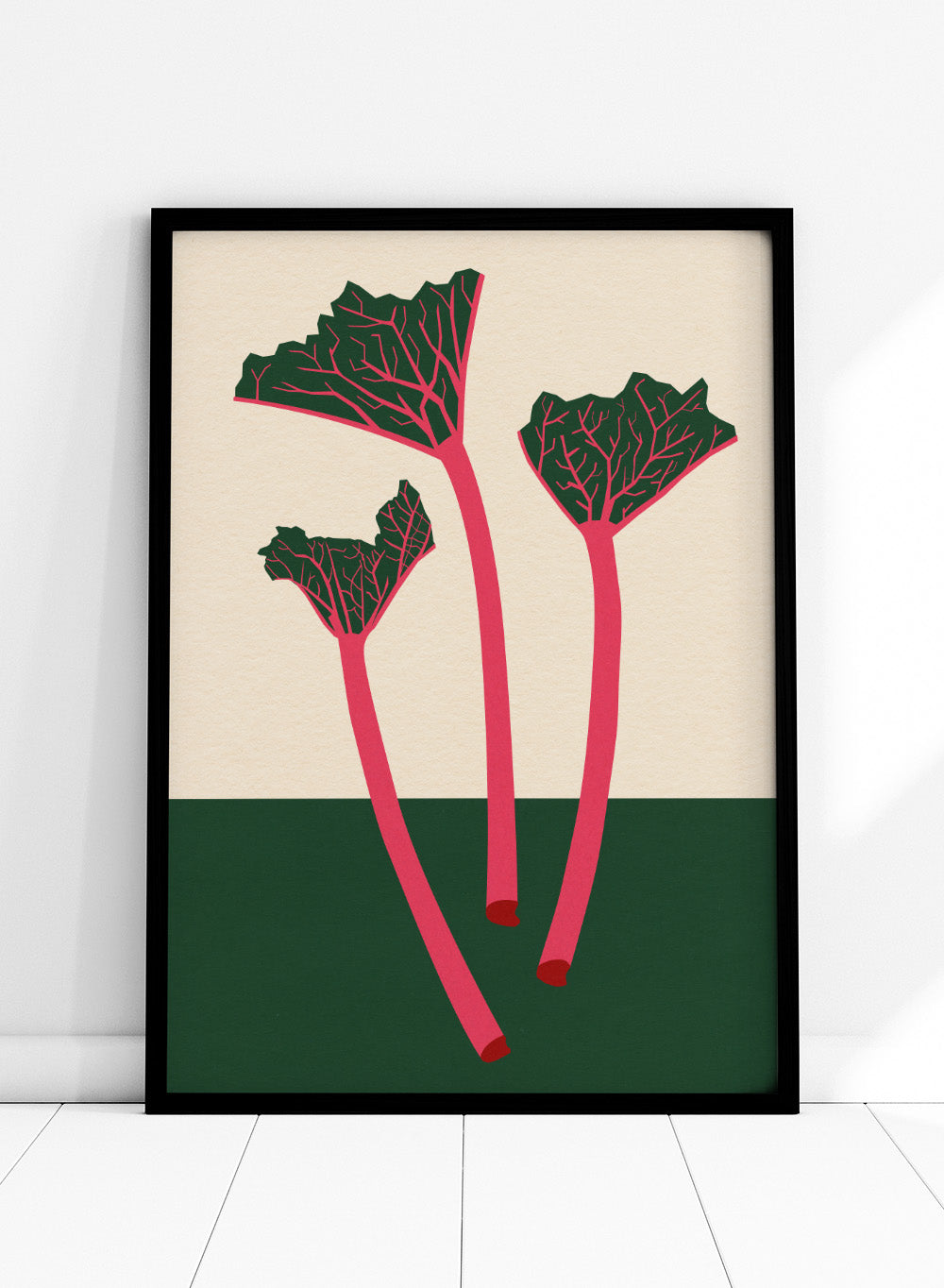 Illustration of red rhubarb stalks with green leaves on a beige and green background. Swedish Garden Rhubarb by Rosi Feist is a modern botanical art print with bold minimalist color and Bauhaus-inspired design. Officially licensed fine art poster with framing.